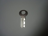 21B  key for Northern Electric 3 slot payphone upper housing 
