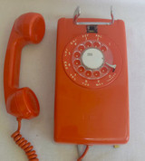 Stromberg Carlson, ITT Rotary dial wall phone Orange 554