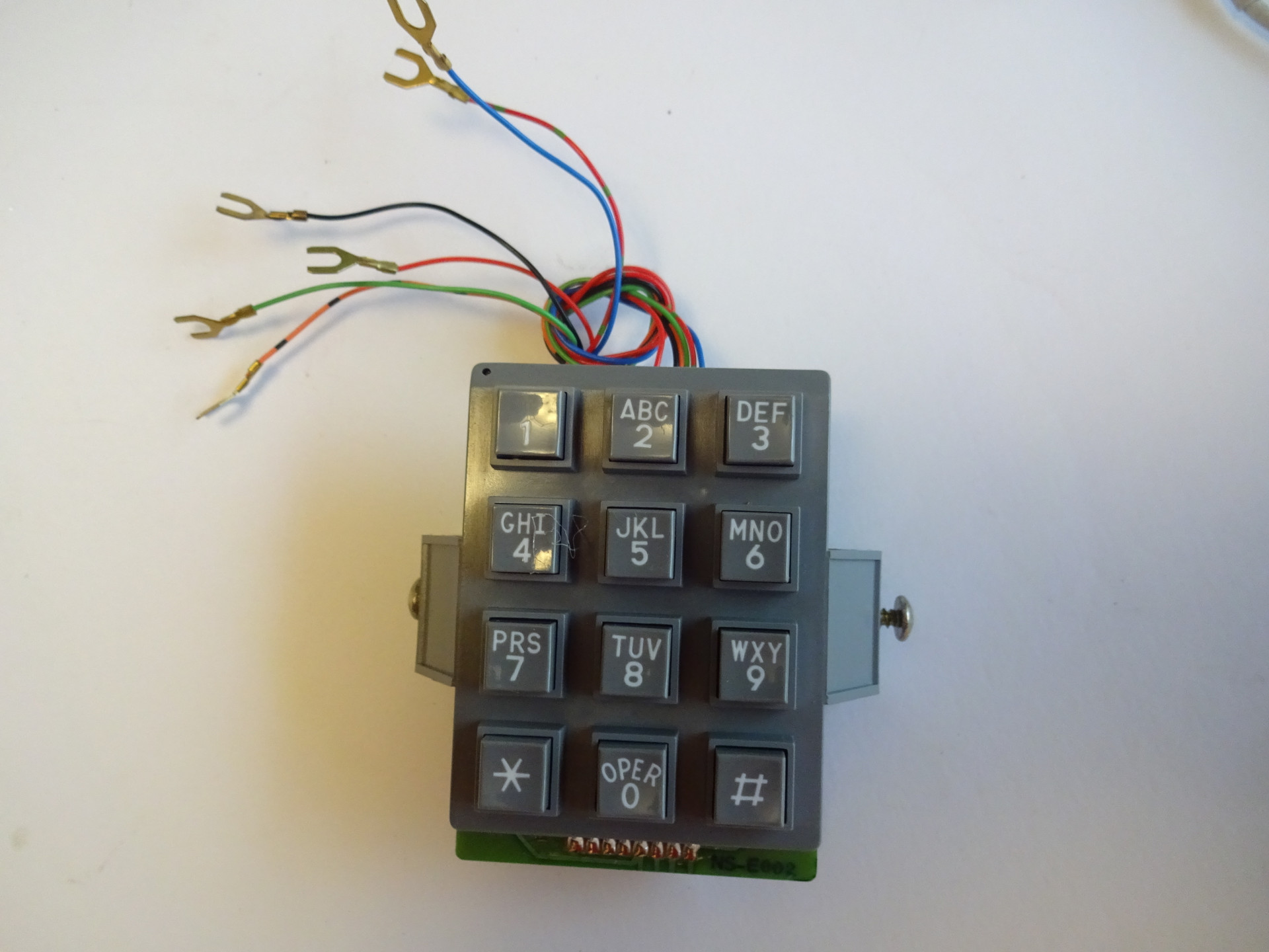 Tone dial is connected between the rotary telephone and jack