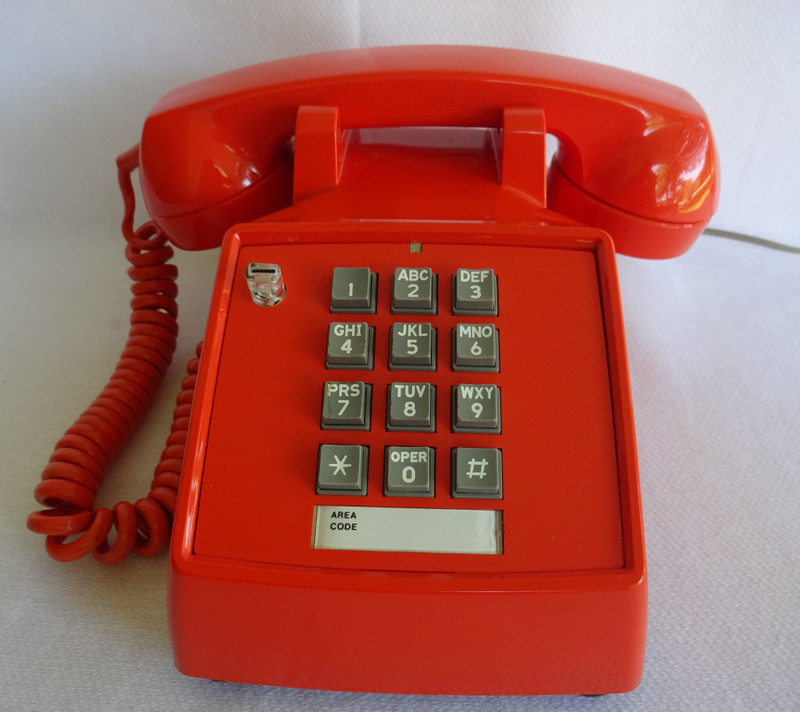 Orange 2500  Stromberg Carlson touch tone telephone