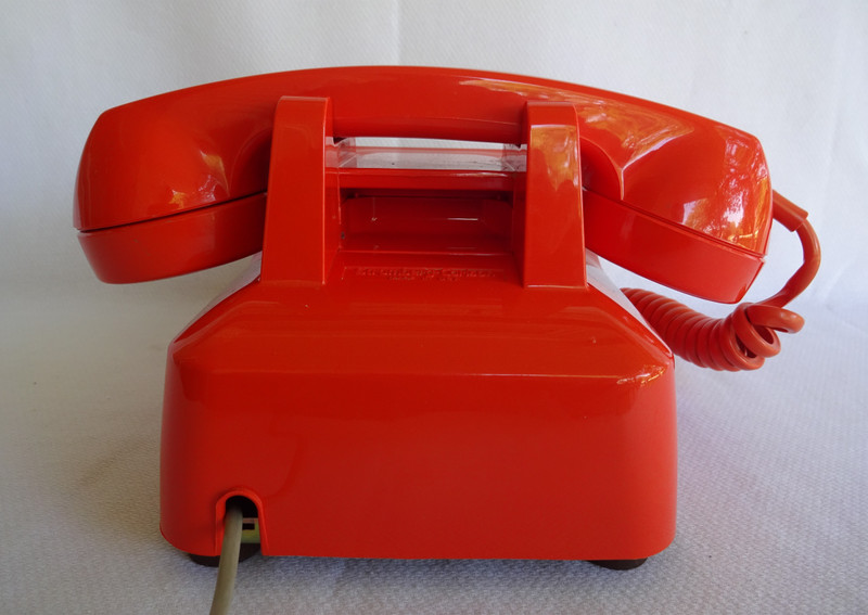 Orange 2500  Stromberg Carlson touch tone telephone