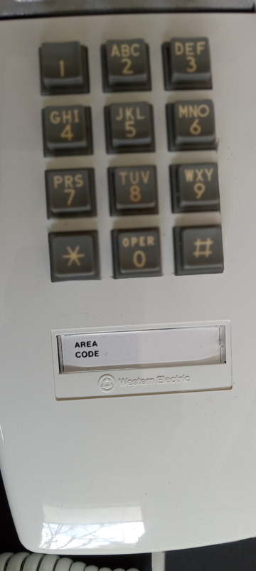 White 2554 wall telephone Touch tone Western Electric