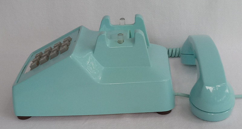 Turquoise 2500 desk telephone made by Stromberg Carlson