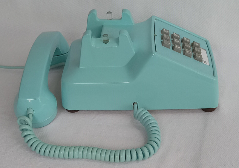 Turquoise 2500 desk telephone made by Stromberg Carlson