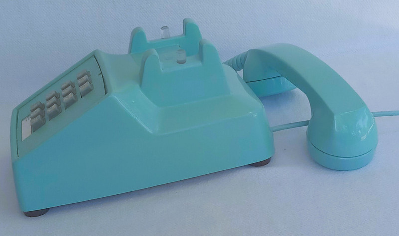 Turquoise 2500 desk telephone made by Stromberg Carlson/ITT