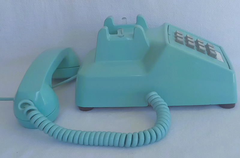 Turquoise 2500 desk telephone made by Stromberg Carlson/ITT