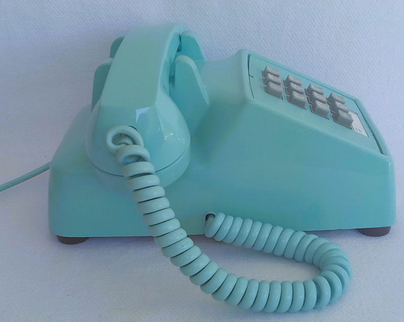 Turquoise 2500 desk telephone made by Stromberg Carlson/ITT