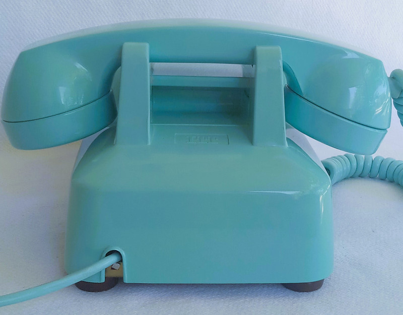 Turquoise 2500 desk telephone made by Stromberg Carlson/ITT