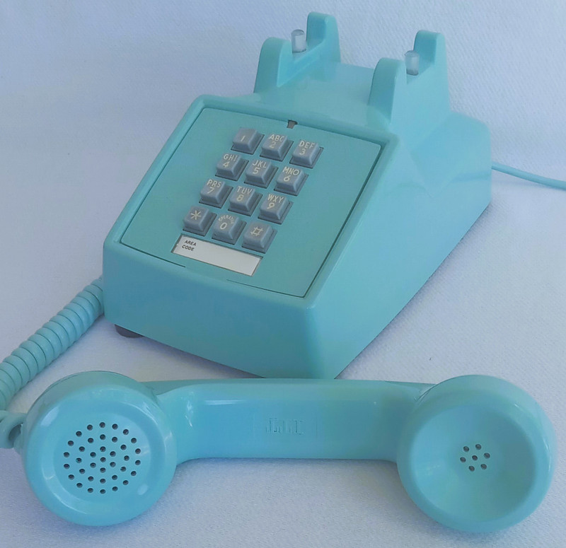 Turquoise 2500 desk telephone made by Stromberg Carlson/ITT