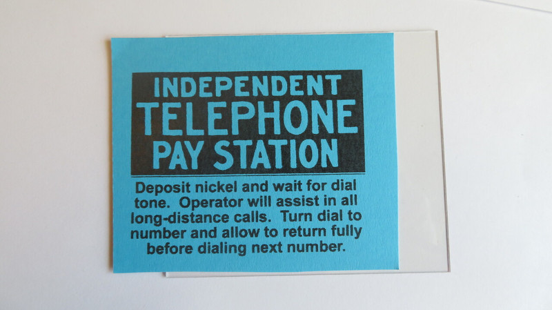 Payphone middle instruction card with plastic 