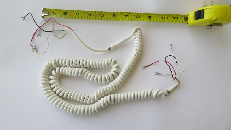 White Western Electric Coiled hardwired handset cord 4 conductor