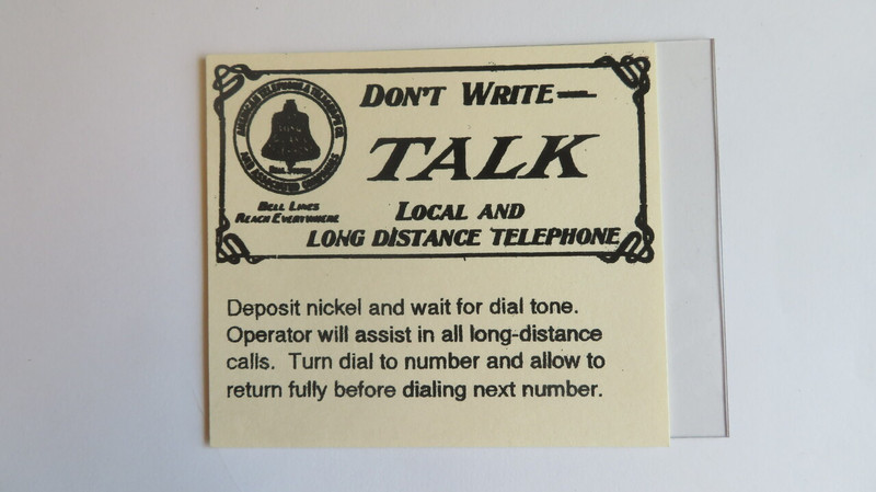 Payphone middle instruction card with  plastic cover