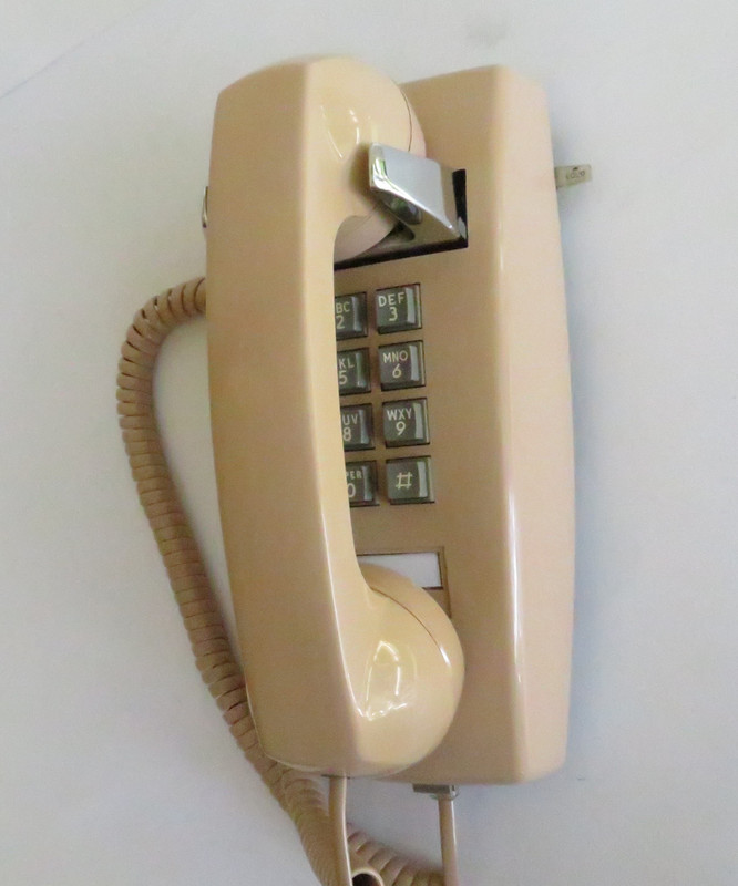 Beige  2554 touch tone wall phone 
