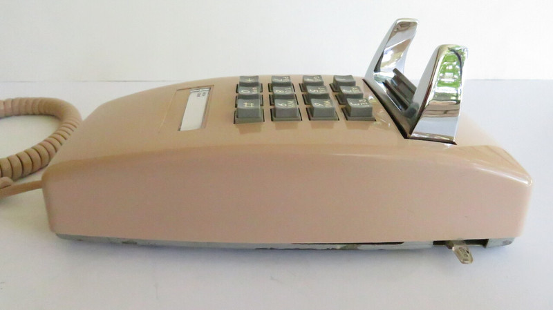 Beige  2554 touch tone wall phone 