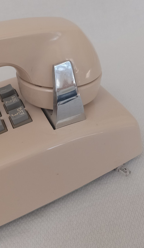 Beige  2554 touch tone wall phone 