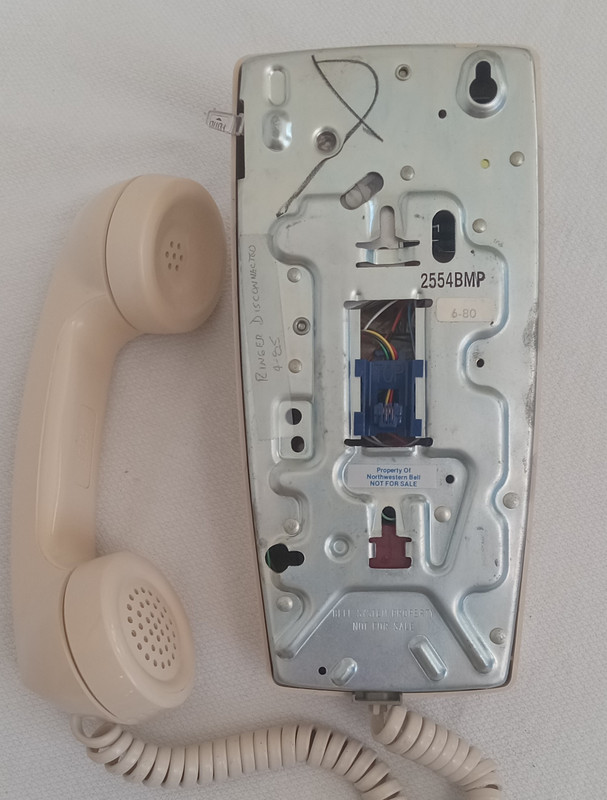 Beige  2554 touch tone wall phone 