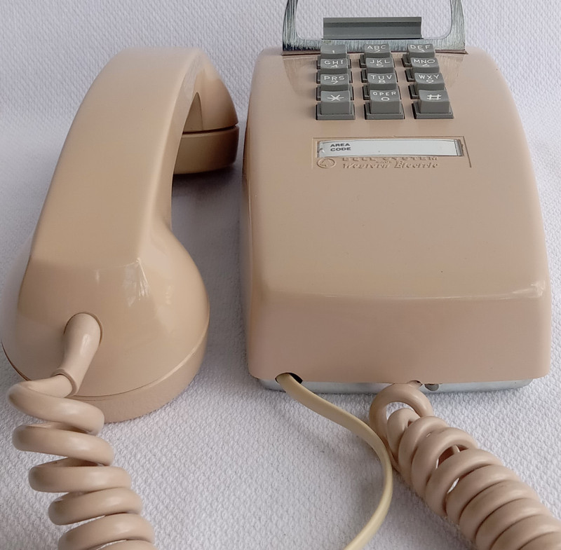 Beige  2554 touch tone wall phone 