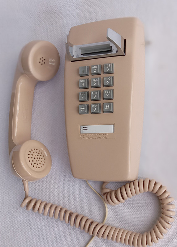 Beige  2554 touch tone wall phone 