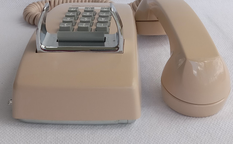 Beige  2554 touch tone wall phone 