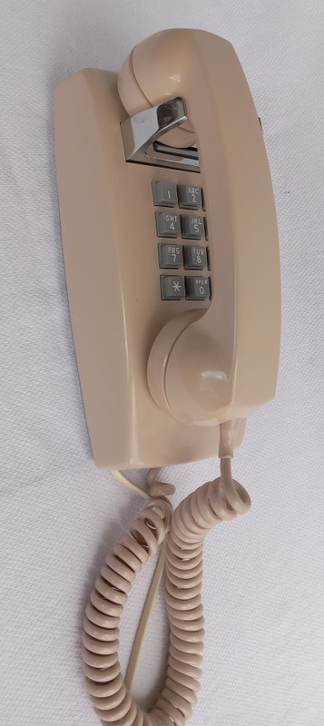 Beige  2554 touch tone wall phone 