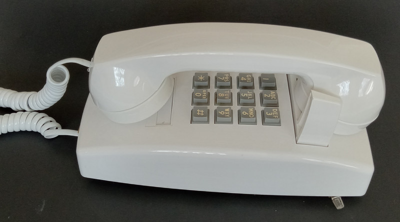   White 2554 wall telephone Touch tone AT&T NOS