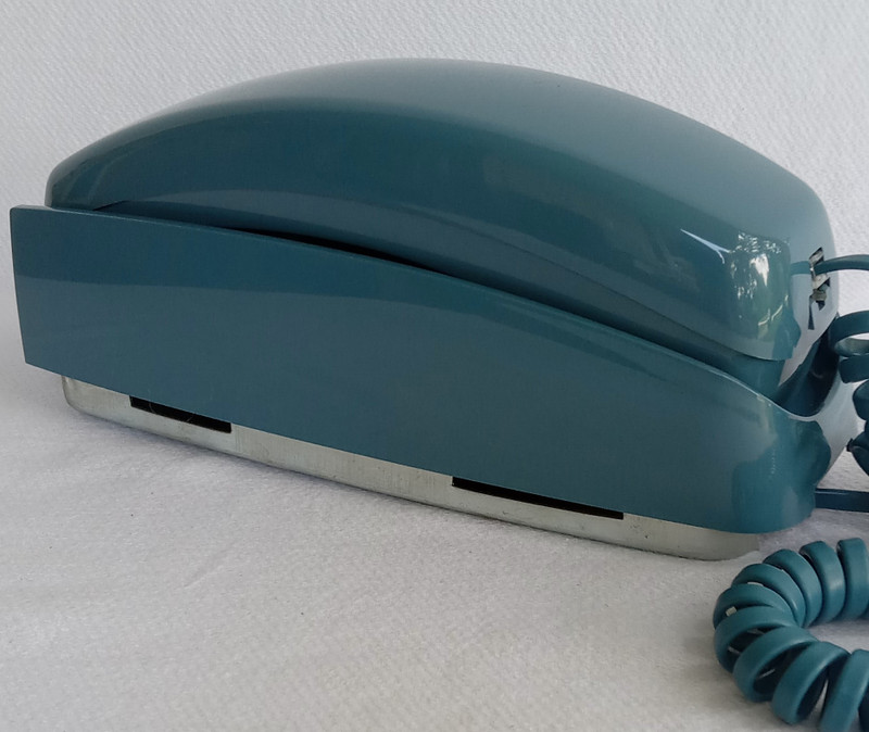 Blue Trimline touch tone wall phone 