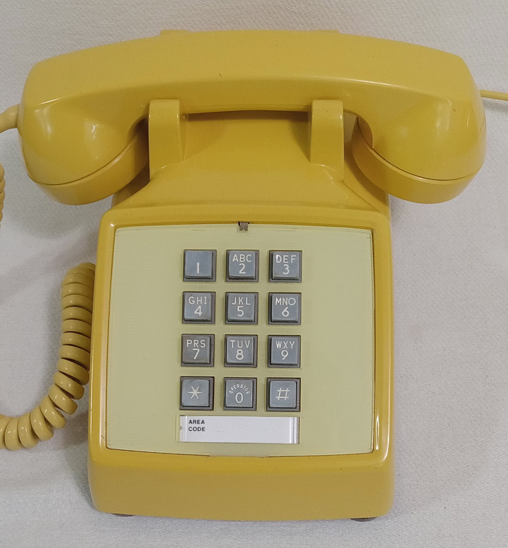 Western Electric 2500DM touch tone phone in Yellow 
