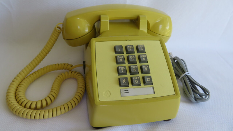 Western Electric 2500DM touch tone phone in Yellow 