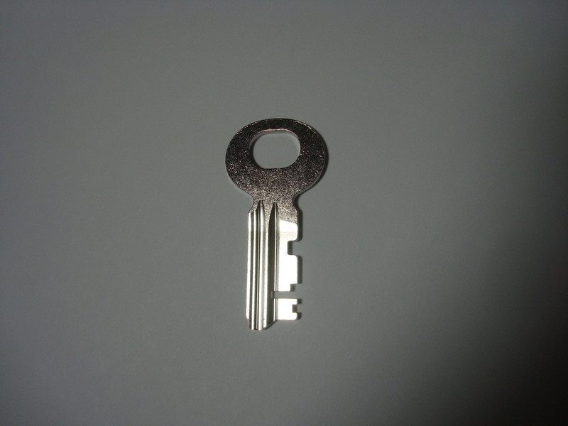 21B  key for Northern Electric 3 slot payphone upper housing 