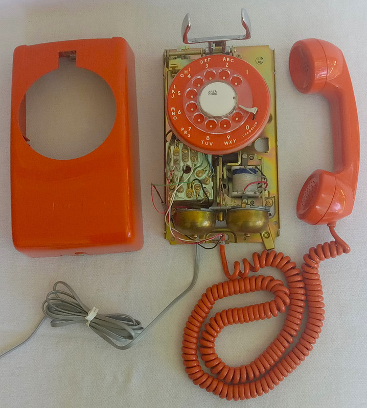 Stromberg Carlson, ITT Rotary dial wall phone Orange 554