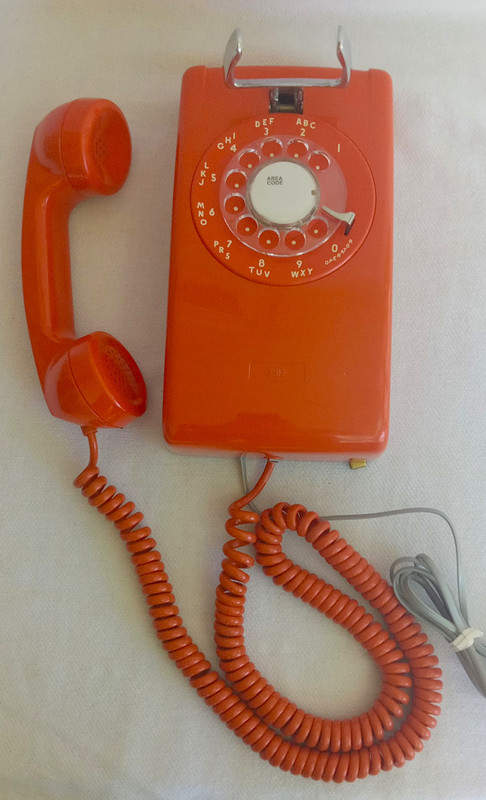 Stromberg Carlson, ITT Rotary dial wall phone Orange 554