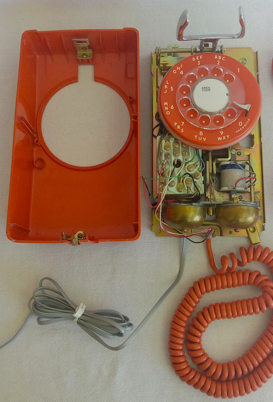 Stromberg Carlson, ITT Rotary dial wall phone Orange 554