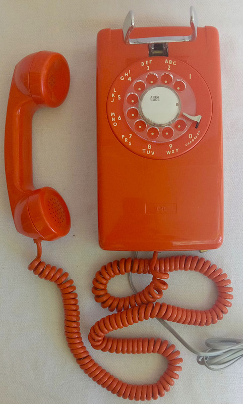 Stromberg Carlson, ITT Rotary dial wall phone Orange 554