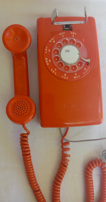 Stromberg Carlson, ITT Rotary dial wall phone Orange 554