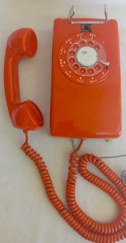 Stromberg Carlson, ITT Rotary dial wall phone Orange 554
