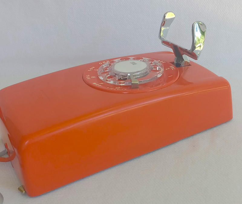 Stromberg Carlson, ITT Rotary dial wall phone Orange 554