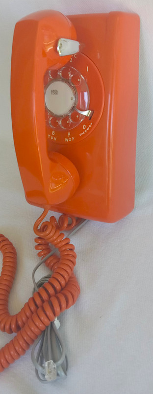 Stromberg Carlson, ITT Rotary dial wall phone Orange 554