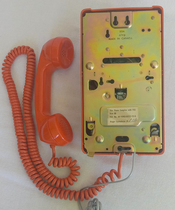 Stromberg Carlson, ITT Rotary dial wall phone Orange 554
