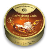 Cavendish & Harvey Cola Drops 175g tin featuring classic cola-flavoured hard candies, available at The Professors. Cavendish & Harvey Cola Drops 175g tin featuring classic cola-flavoured hard candies, available at The Professors.