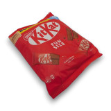 KitKat Fun Size bag with vibrant red packaging, showcasing 50 fun-sized bars perfect for sharing and snacking. KitKat Fun Size bag with vibrant red packaging, showcasing 50 fun-sized bars perfect for sharing and snacking.