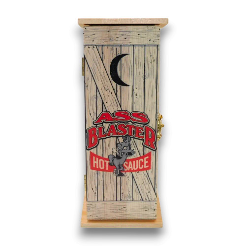 Ass Blaster Hot Sauce in a unique wooden outhouse display, ideal for gifts or collectors.