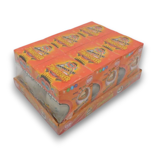 Right angled view of six Zed Candy Monster Jawbreakers in colourful individual boxes and display tray.