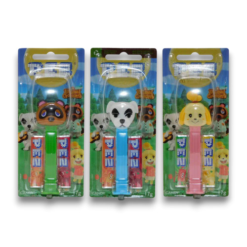 Pez Candy Dispensers - Animal Crossing collection, displaying three character designs—Isabelle, K.K. Slider, and Tom Nook—in individual blister packs.