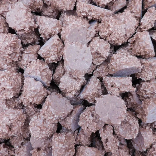 Choco Nuts Milk Chocolate Coconut Rough pieces with milk chocolate coating and coconut centres from a 5kg box, available at The Professors