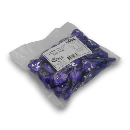 Close-up of individually wrapped heart-shaped chocolate in purple foil from the Pauls Milk Chocolate Hearts 500g bag