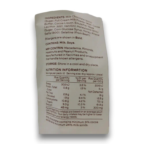 Nutritional information and ingredients list of Coco Oro's Milk Chocolate Honeycomb, packaged in a 160g resealable bag.
