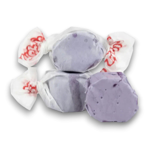 Close-up of purple Taffy Town Grape Salt Water Taffy individually wrapped in wax paper, available at The Professors Online Lolly Shop.