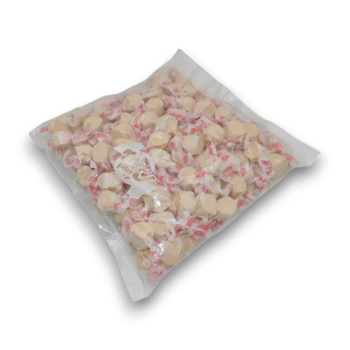 Taffy Town Butterscotch Salt Water Taffy 1.1kg bulk bag filled with individually wrapped creamy taffy pieces.
