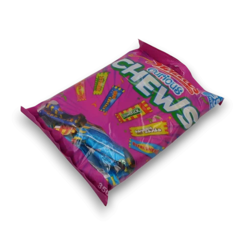 Swizzels Curious Chews 350g bag containing assorted individually wrapped Swizzels chewy sweets.