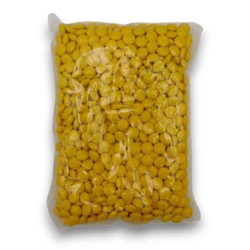 Sweet Treats Yellow Choc Buttons 1kg bag featuring bright yellow candy-coated chocolate buttons.